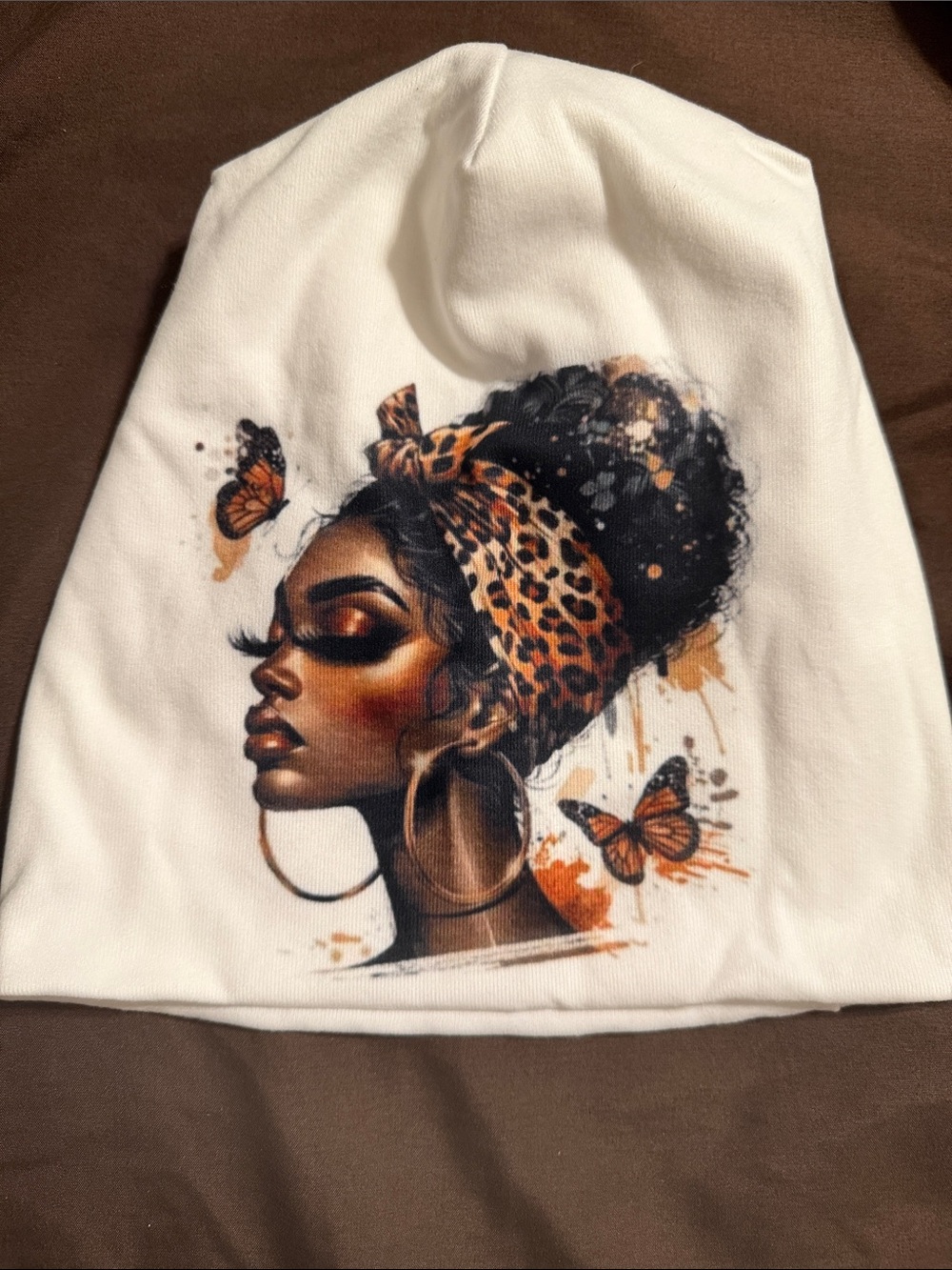 White Beanie with Artistic Black Woman Portrait and Leopard Headwrap
